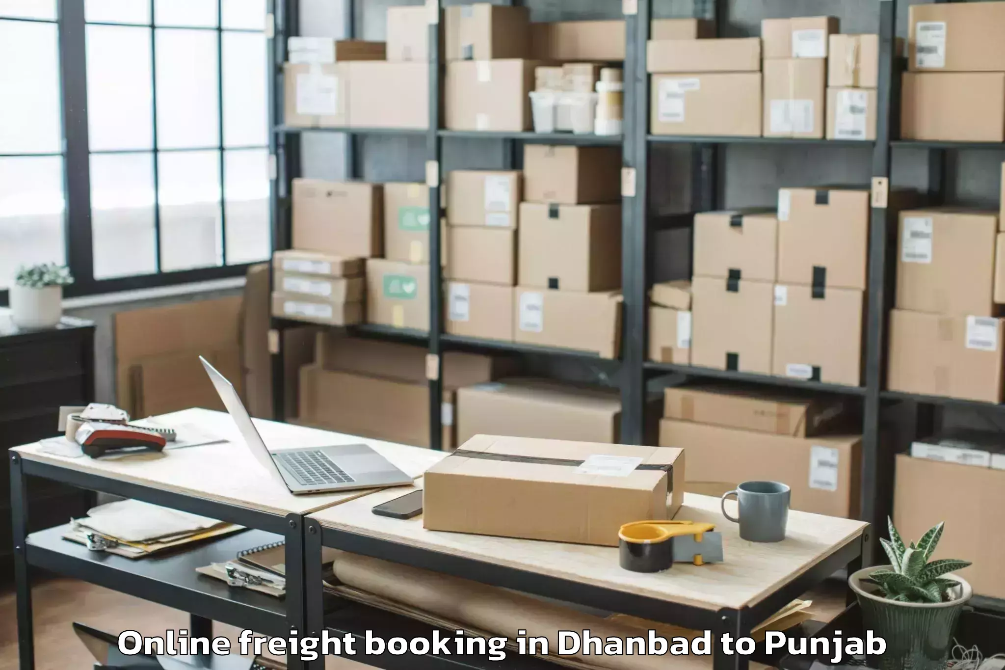 Trusted Dhanbad to Bagha Purana Online Freight Booking